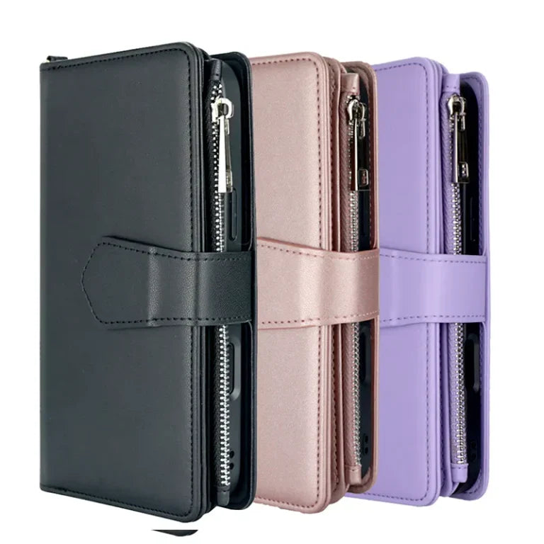 Three phone cases in black, pink, and purple
